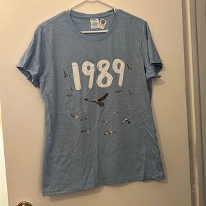 SOLD. Taylor Swift 1989 graphic tee. Size large. Never worn.